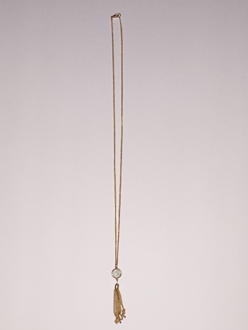 Delicate Gold Pendant Necklace with Clear Crystal and Tassel
